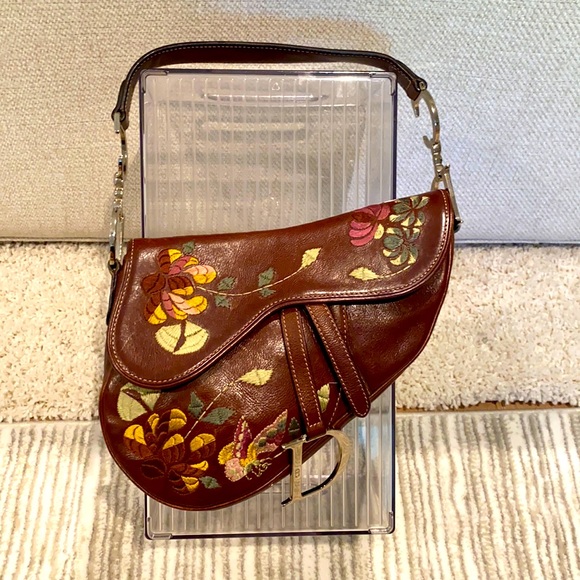 Dior Handbags - Christian Dior Saddle Bag. Leather. Stitching floral design.